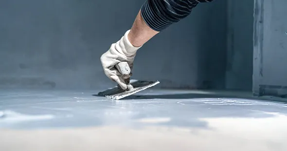 Epoxy flooring trowel on surface for flooring in Martinsburg, WV.