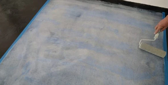 Damaged epoxy floor being repaired.