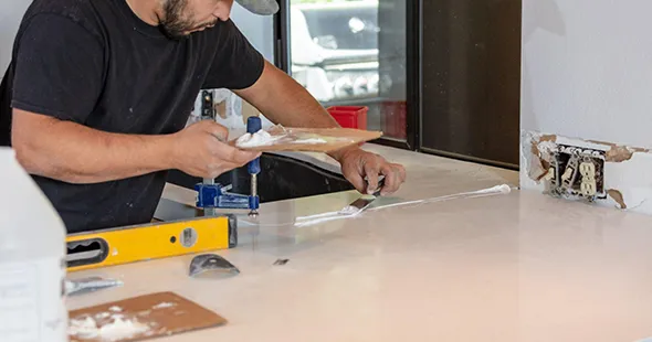 Sealing and finishing countertop in Denver, Colorado.