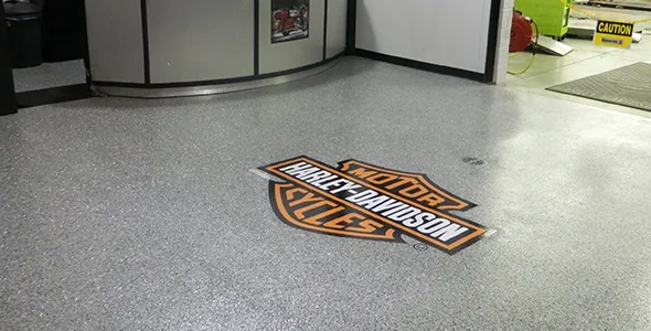 Harley-Davidson logo on epoxy floor in Colorado Springs, CO.