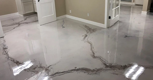 Cracked concrete floor covered with epoxy in Colorado Springs, Colorado.