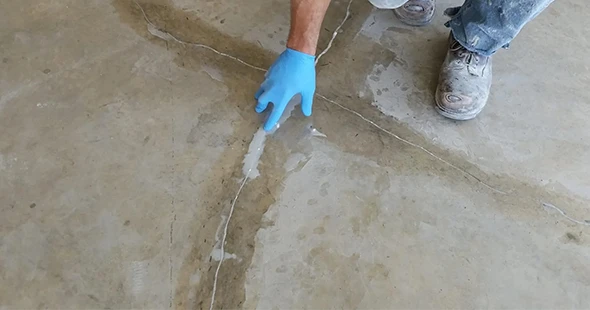 Repairing cracked epoxy floor in Colorado Springs, Colorado.